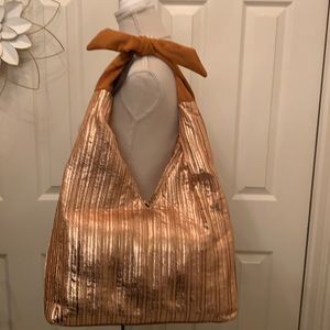 Moda Luxe rose gold color hobo bag!